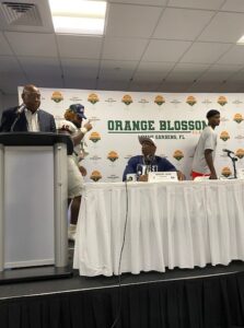 Deion Sanders giving speech