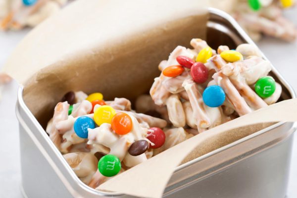 Leftover Halloween candy paired with salty snacks, a unique and irresistible combination