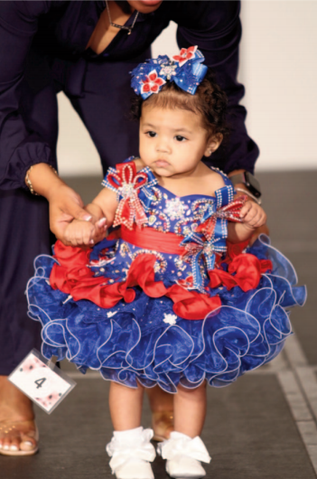 Lighting Up Lansing – One Smile at a Time Aryla Naomilynn Bernard